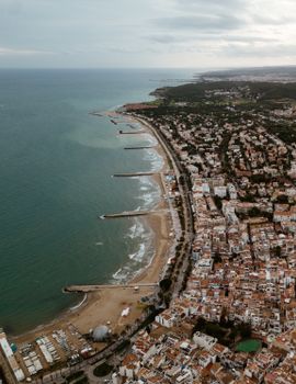 Explore the stunning Mediterranean coastline of Sitges, a picturesque seaside town in Spain.