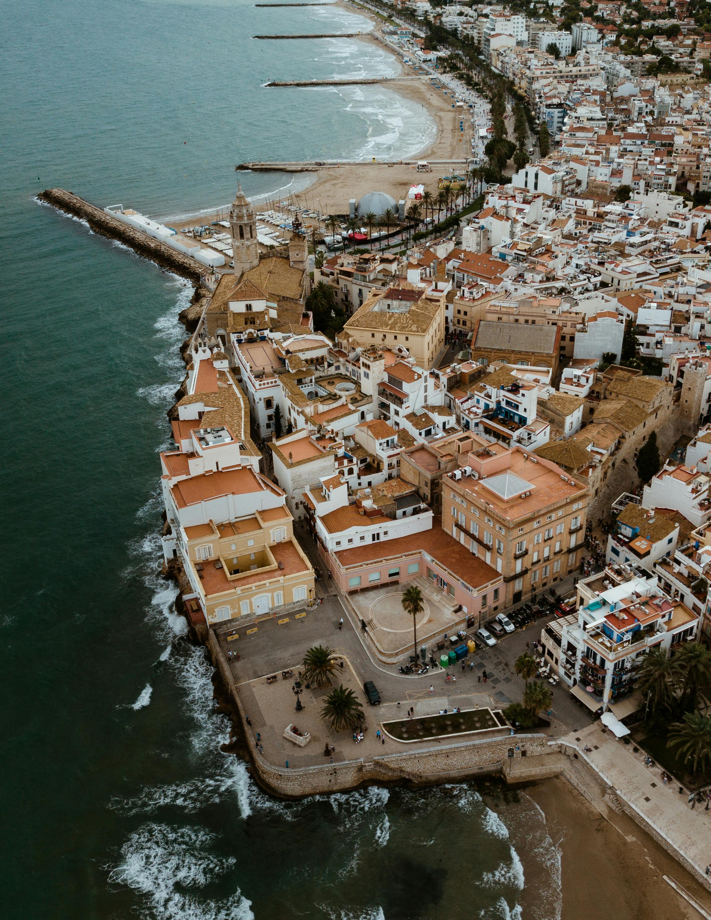 aerial photo of an old town by the sea