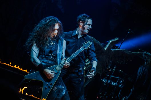 Man Playing Black Flying V Guitar