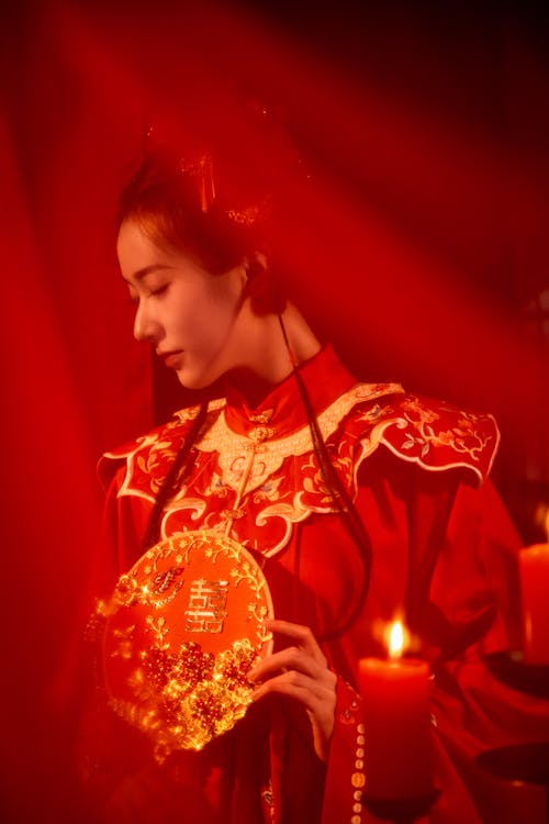 Asian Woman in Traditional Bridal Clothing 