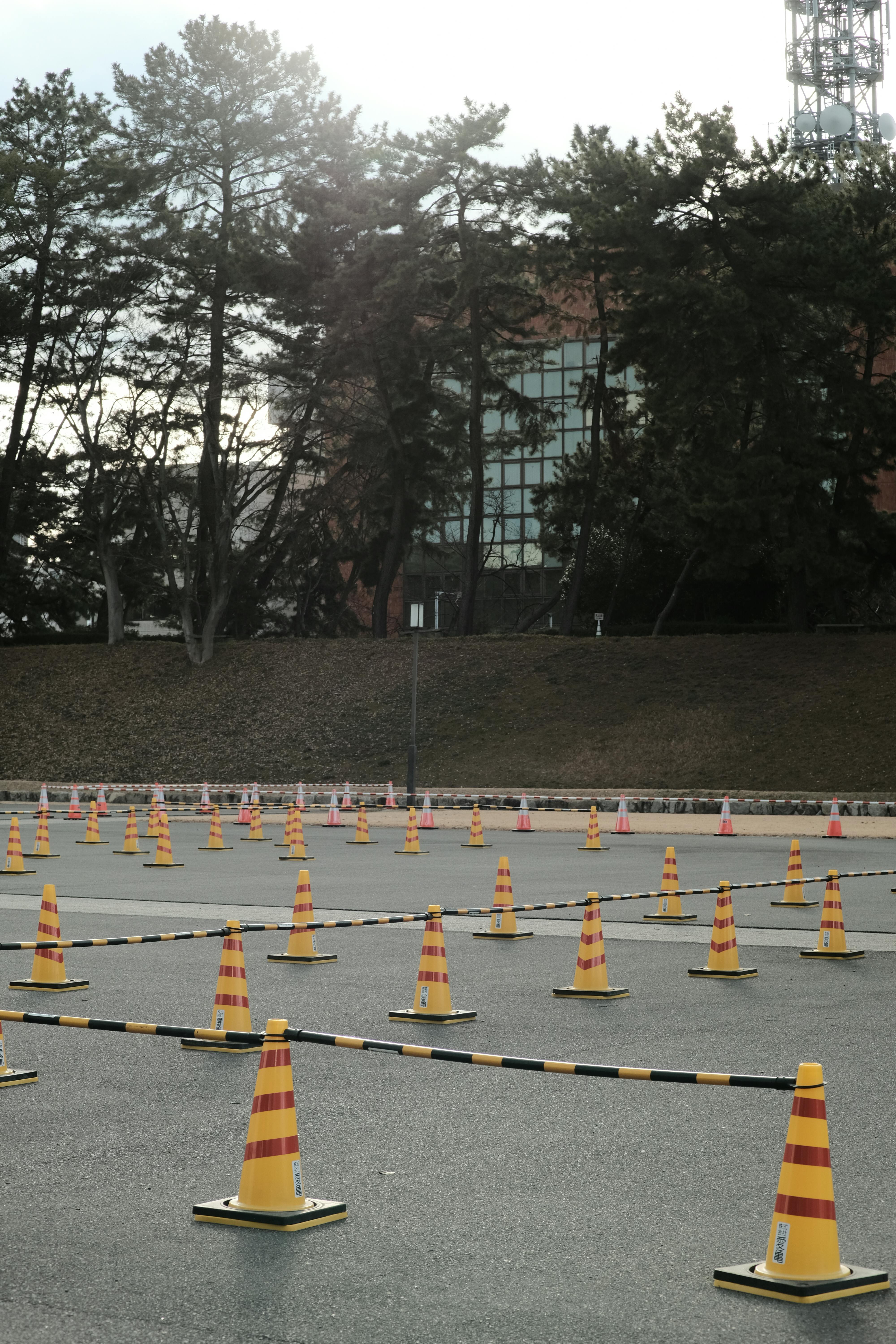 Outdoor driving course with traffic cones setup for training and practice.