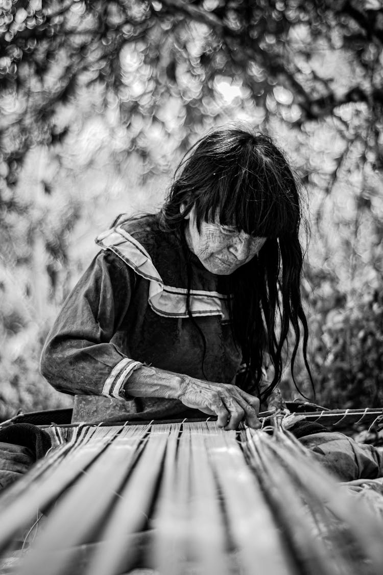 Elderly Woman Working In Black And White