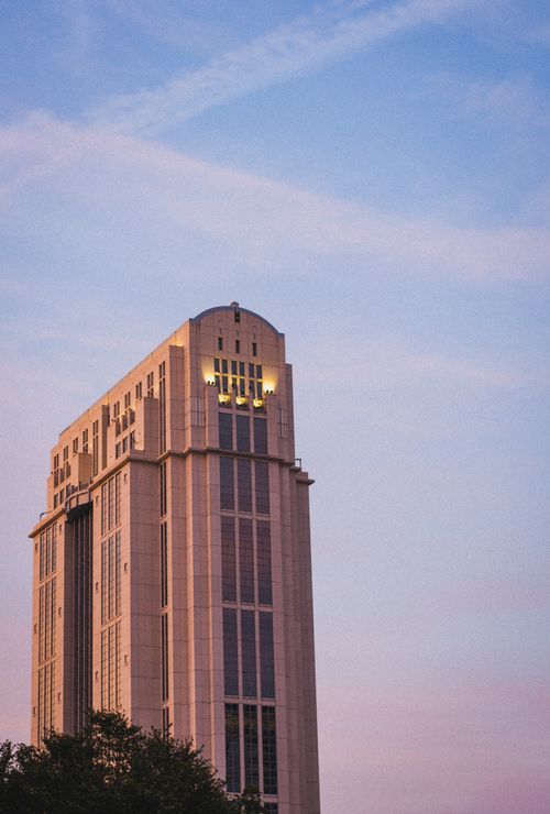 Free Towering courthouse in Orlando, Florida, backlit by a beautiful sunset sky. Stock Photo