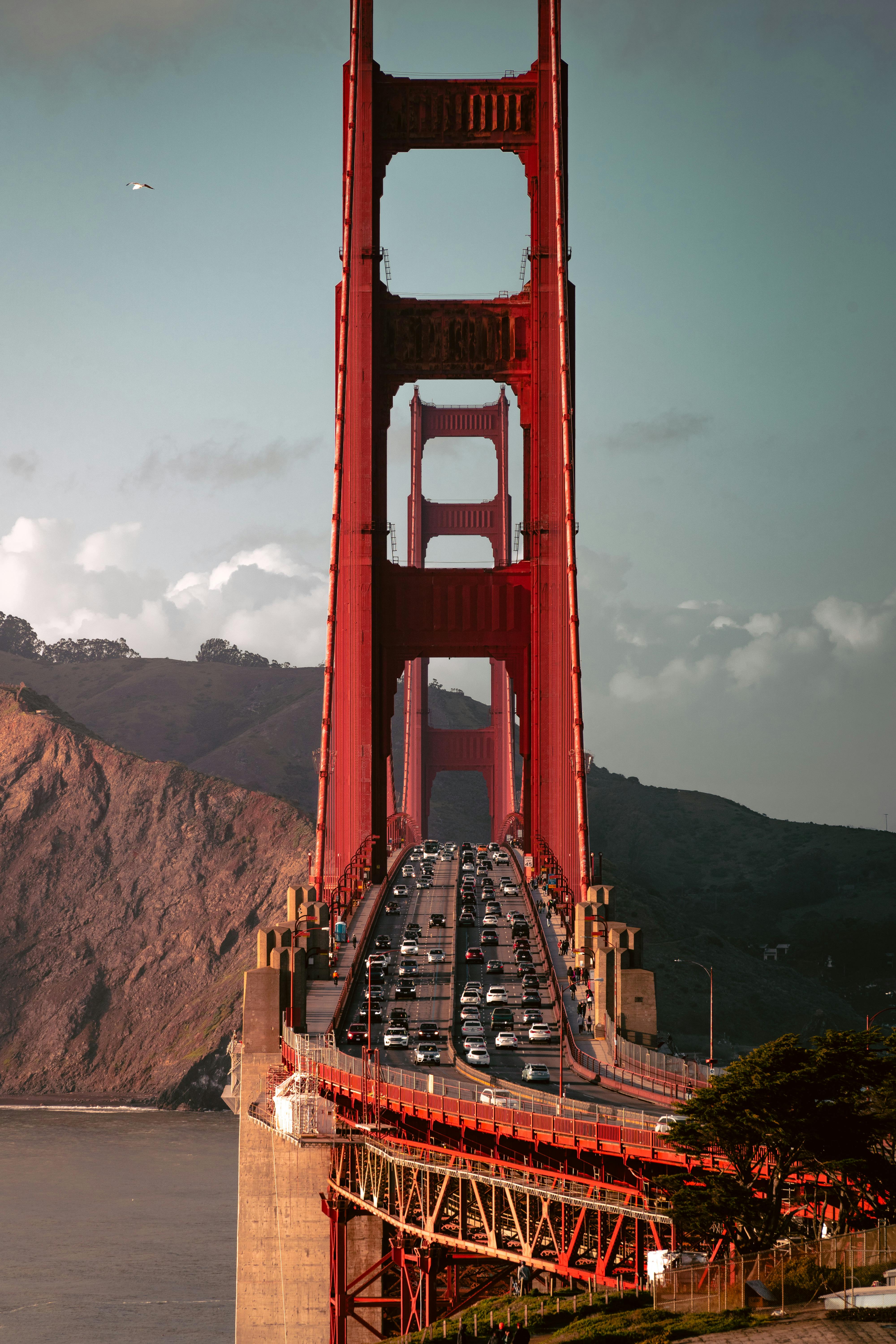Stunning view of the Golden Gate Bridge filled with traffic under a clear sky, perfect for travel inspirations.