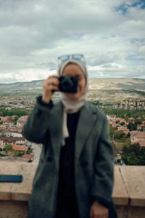 Základová fotografie zdarma na téma držení, fotoaparát, hidžáb