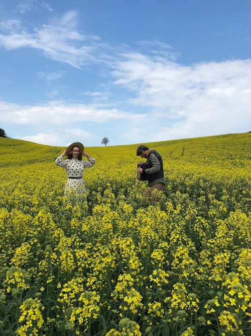 Man and Woman in Rapeseed Field