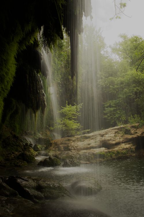 Free Tranquil scene of the serene Düden Waterfall cascading in lush Antalya forest. Stock Photo
