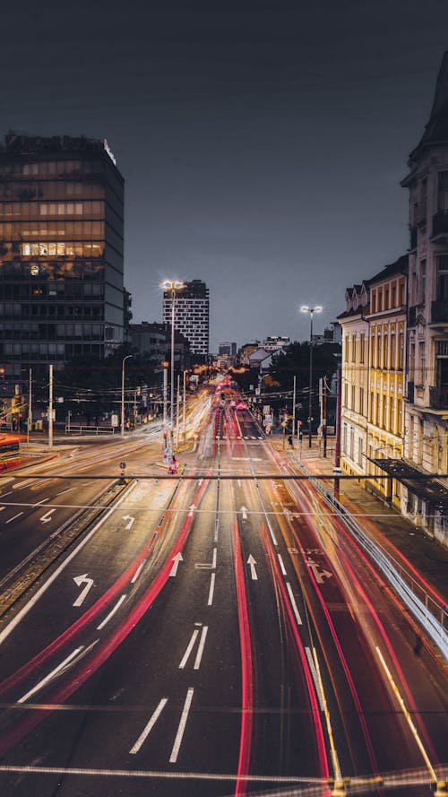 Foto stok gratis distrik pusat kota, jalan-jalan kota, jejak cahaya
