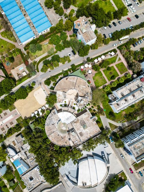 Free Aerial view of circular buildings and town layout in Lefke, showcasing urban planning. Stock Photo