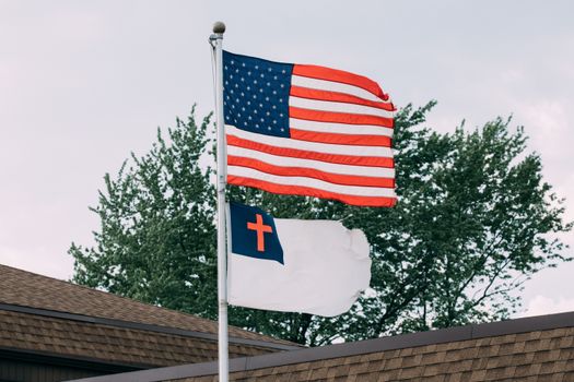 An American and a Christian Flags