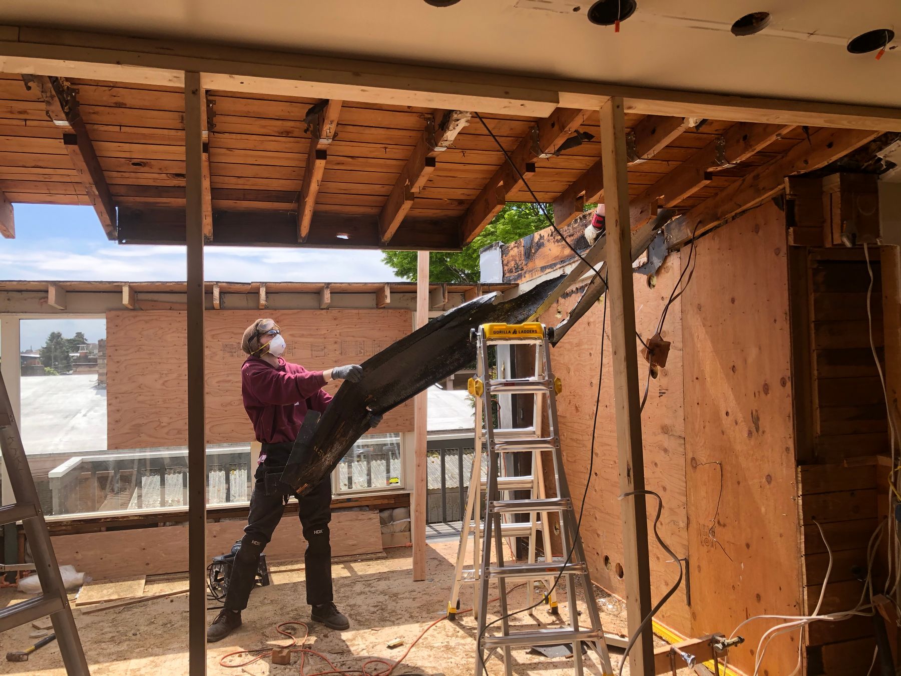 Landscaping crew preparing materials at a residential job site