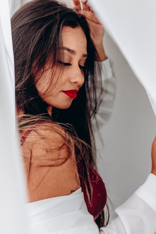 Brunette Woman Posing with Eyes Closed