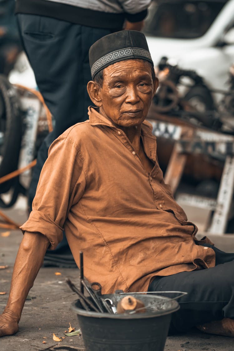 Elderly Man In Hat And Shirt