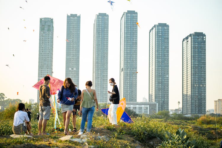 Group Of Friends In Front Of High Business Buildings 