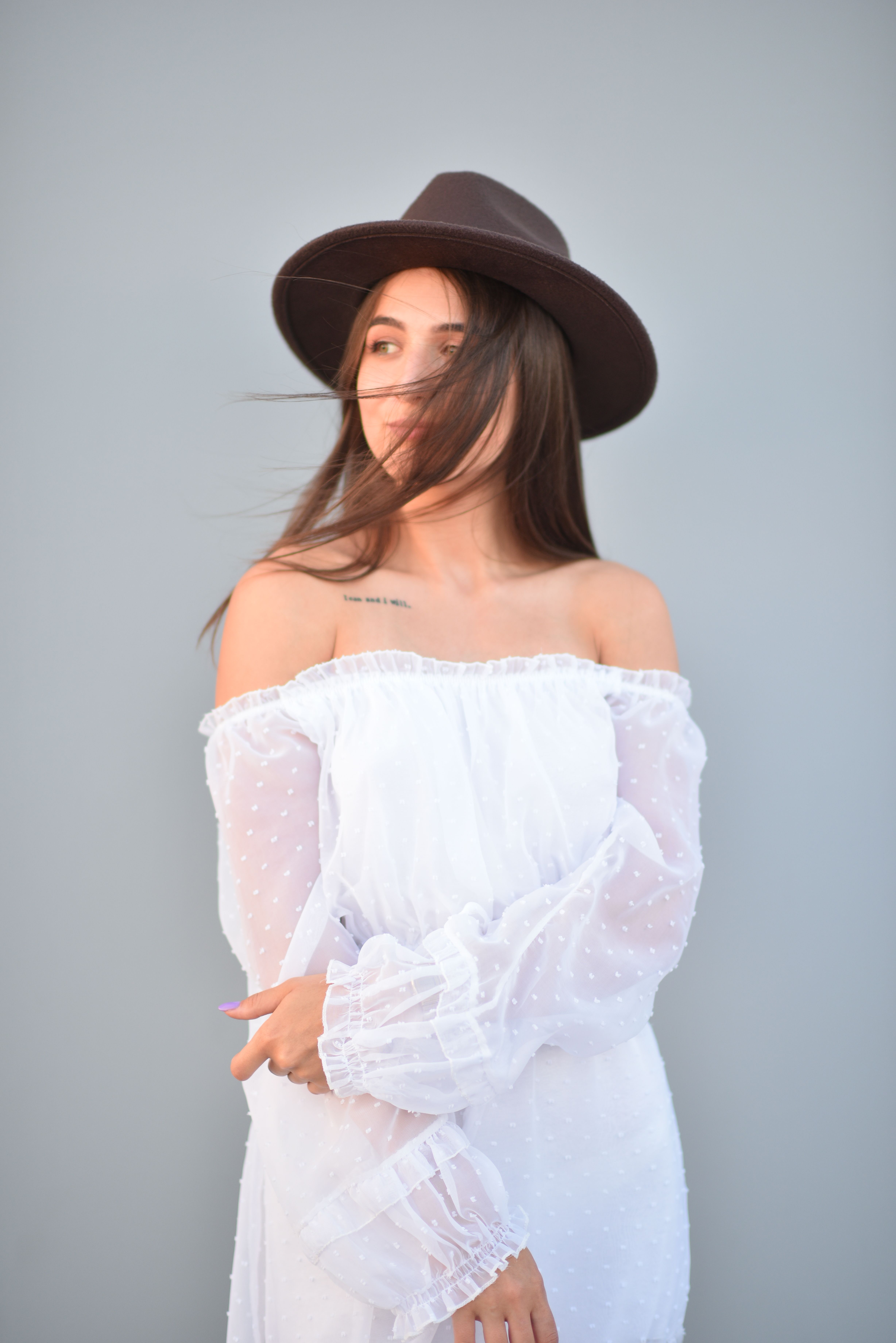 Young Woman in a White Dress and a Hat · Free Stock Photo