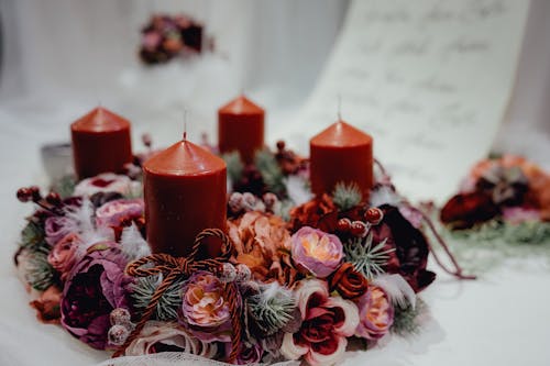 Free Four Red Pillar Candles on White Surface Stock Photo