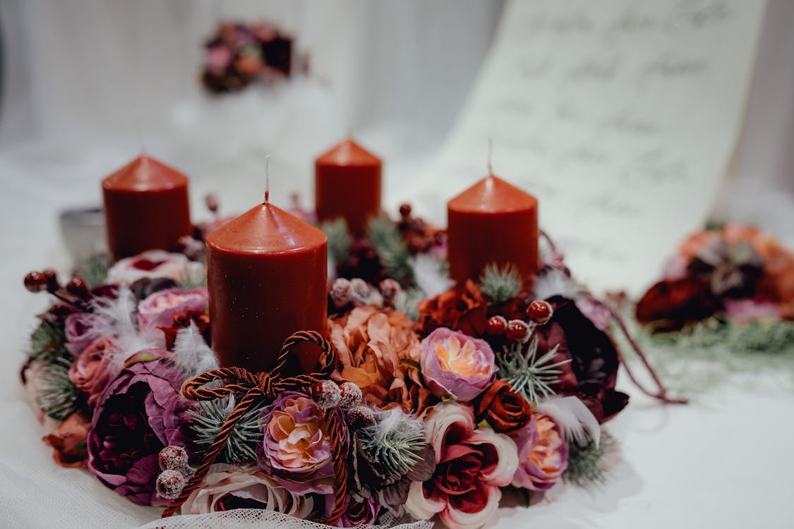 Free Four Red Pillar Candles on White Surface Stock Photo