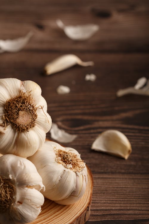 Garlic on a Wooden Counter Top · Free Stock Photo Garlic on a Wooden Counter Top · Free Stock Photo