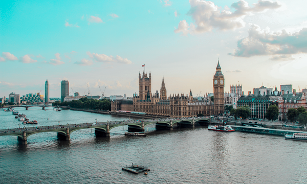 Captivating aerial view of Westminster Palace, Big Ben, and River Thames in London, UK.