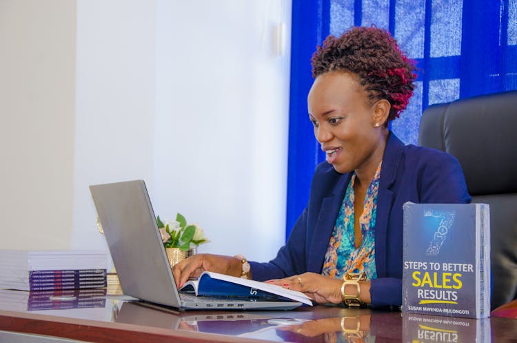 Woman Working On Laptop In An Office 