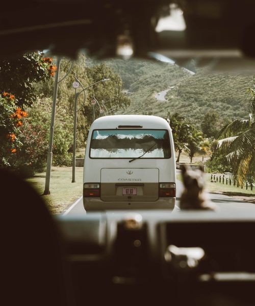 Free A scenic view from a car dashboard on a clear summer day, perfect for a road trip vibe. Stock Photo