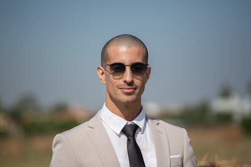 Portrait of an Elegant Bald Man on a Desert 