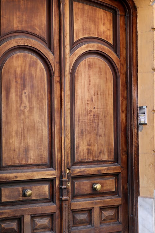 Antique Wooden Door at the Entrance to a Building 