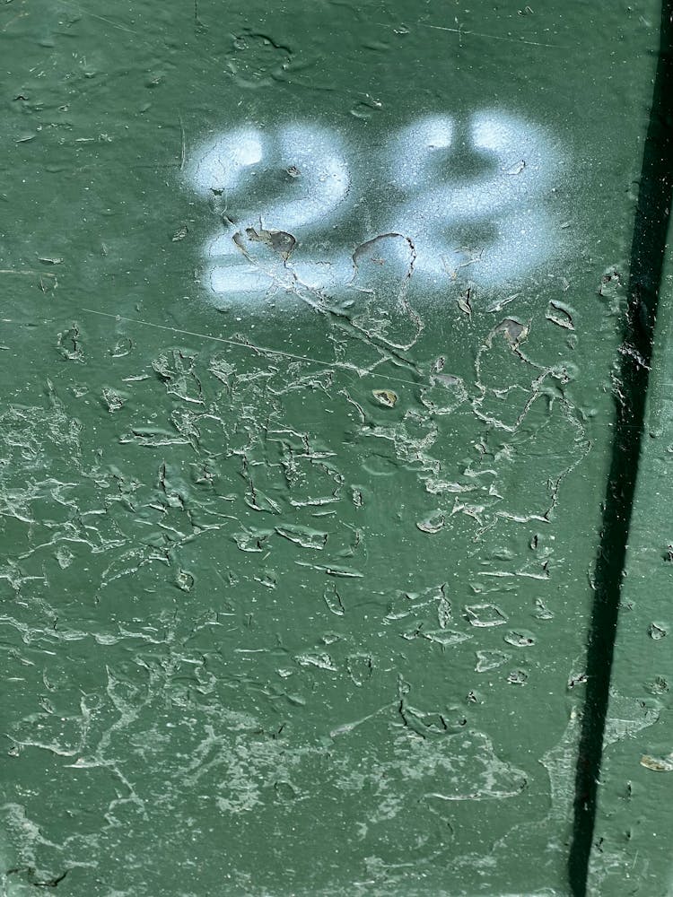 Spray Number On Green Wall