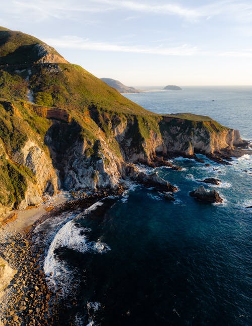 Clear Sky over Sea Shore with Cliff