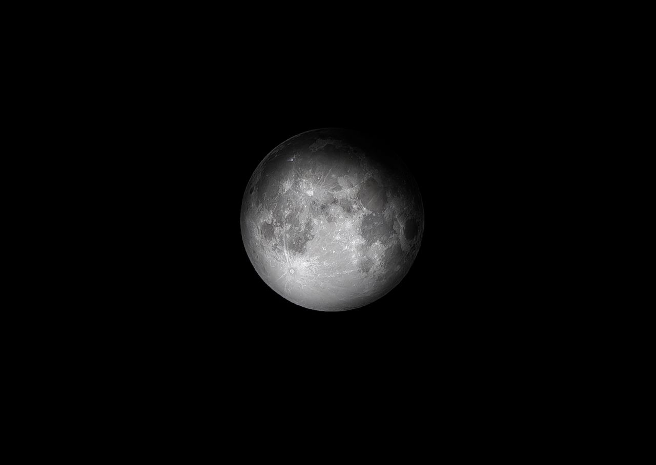 stunning black and white image of the moon against a dark night sky pe
