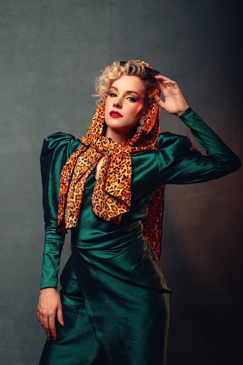 Woman Posing in Green Clothes and Shawl