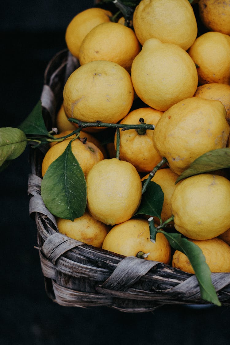 A Bunch Of Lemons In A Basket 