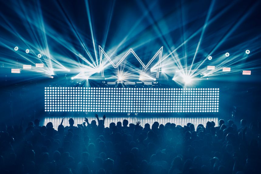 Concert stage washed in laser beams — Wendy Wei on Pexels