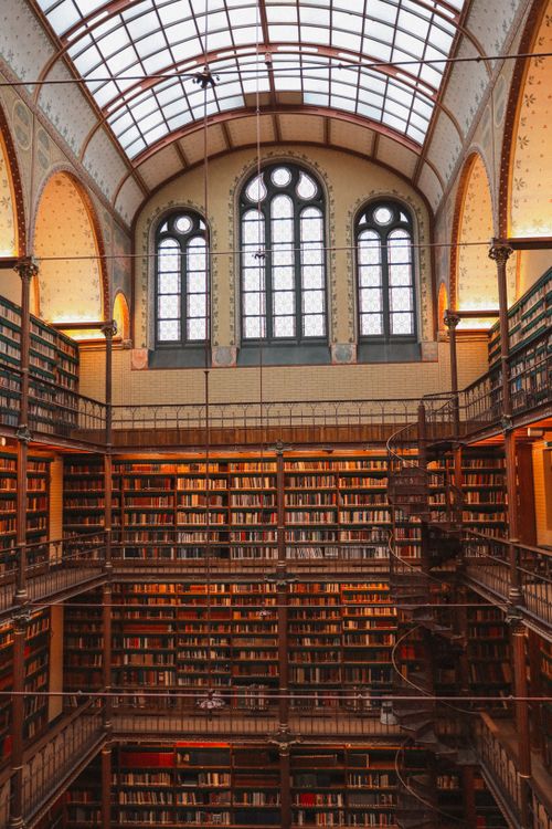 Free A breathtaking view inside the historic Rijksmuseum Library in Amsterdam, showcasing its architectural beauty. Stock Photo