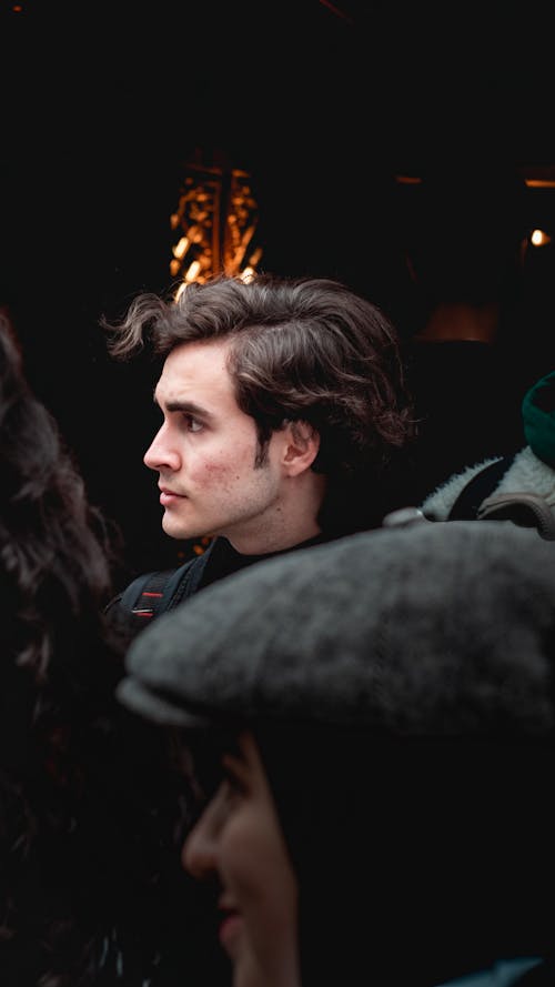 A Young Man Among Crowd