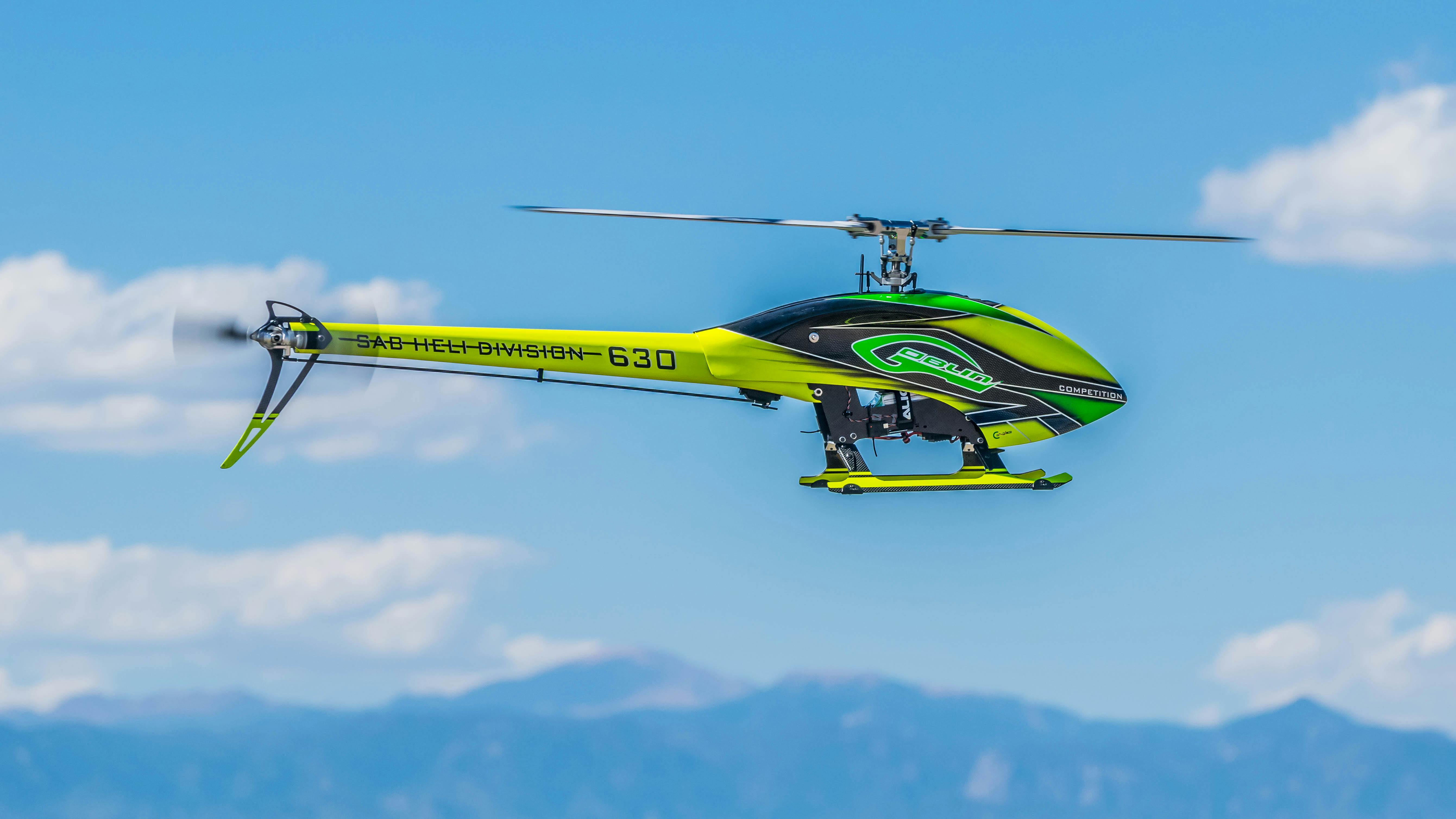 Green Black and Yellow Heli Division 630 Helicopter · Free Stock Photo