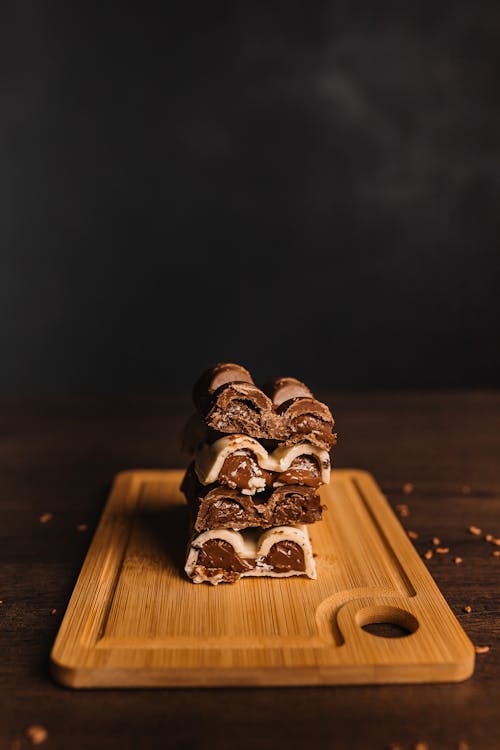 Chocolate Bars on a Wooden Cutting Board 