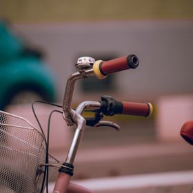 Handlebar view from a moving bike — photo by Hortobágyi Marcell on Pexels