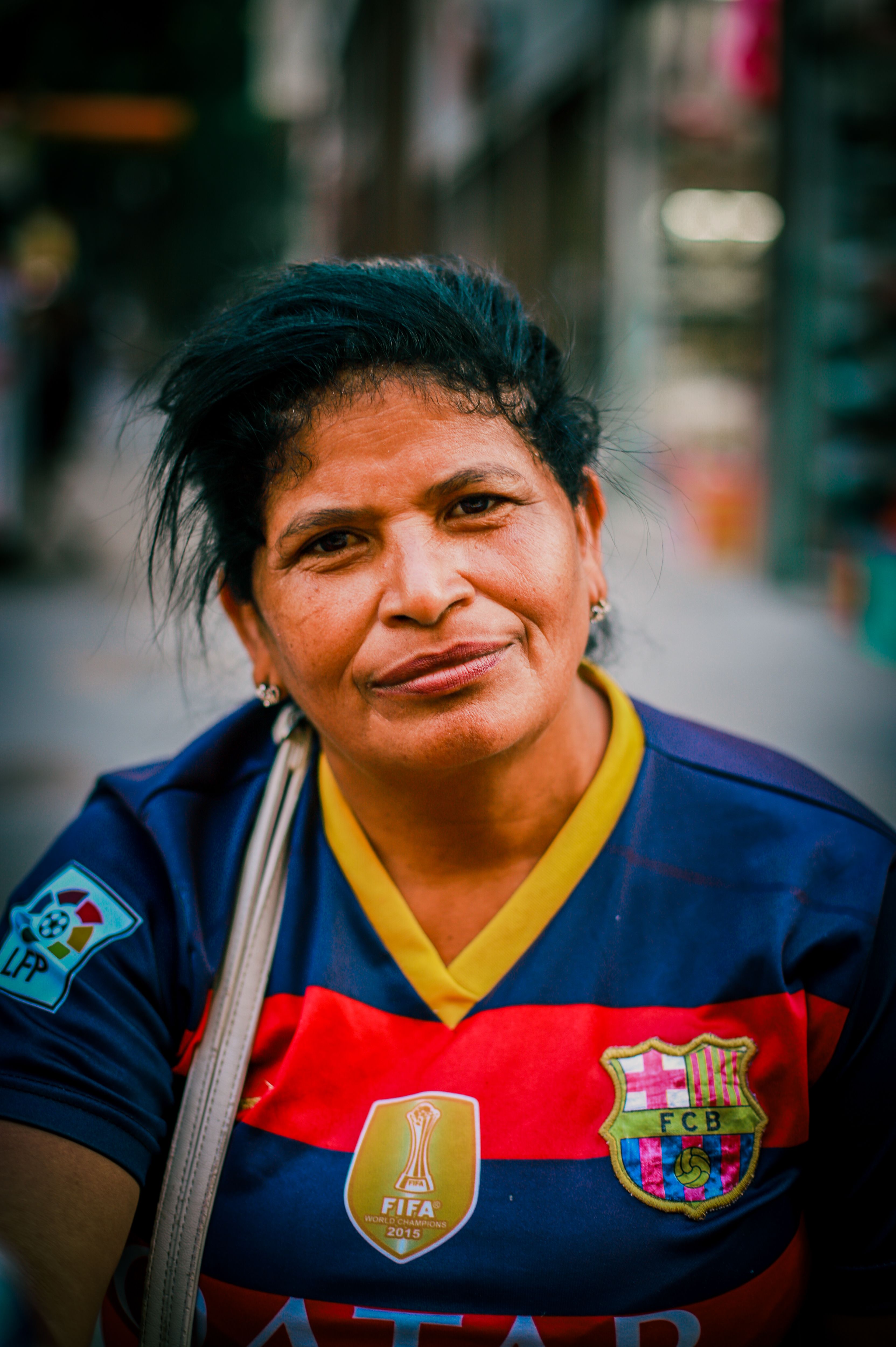 portrait of woman in barcelona t shirt