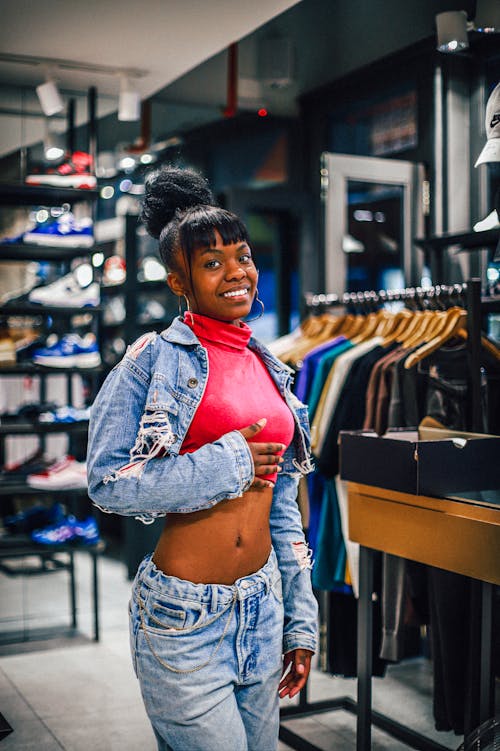 Smiling Woman at Clothes Store