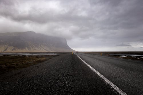 Empty Asphalt Road in Mountains Landscape