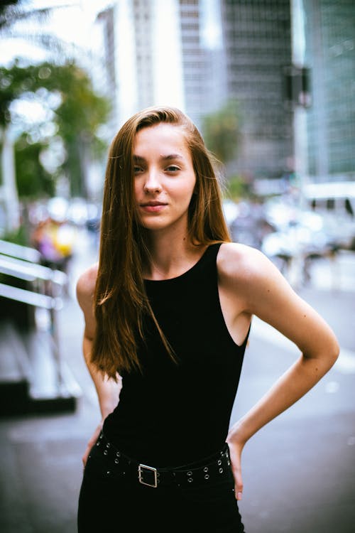 Young Woman in Black Jeans and Tank Top 