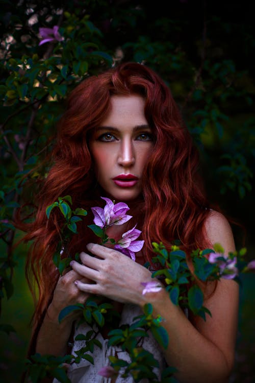 Redhead Woman with Flowers