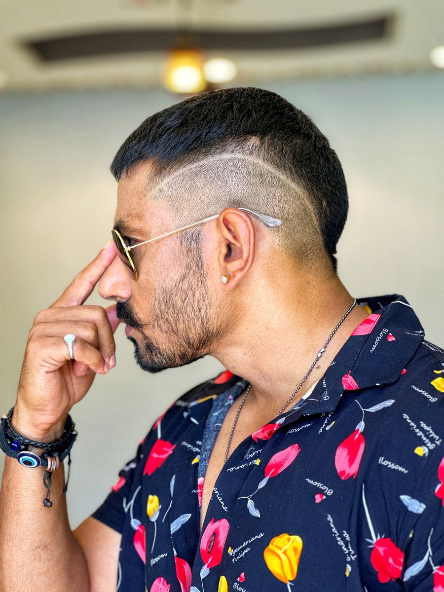 Slick Back con Taper Fade