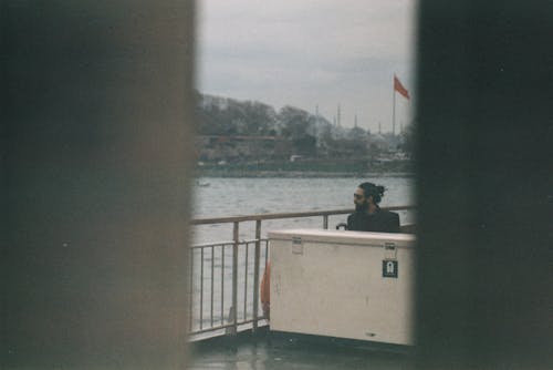 Man Sitting near Sea in Istanbul