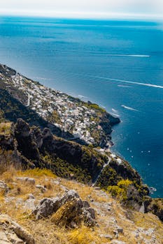 Breathtaking high angle view of the Amalfi Coast's sea and town in Campania, Italy.