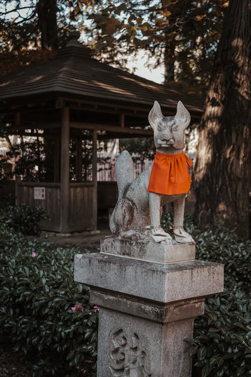 Cloth on Dog Statue in Park