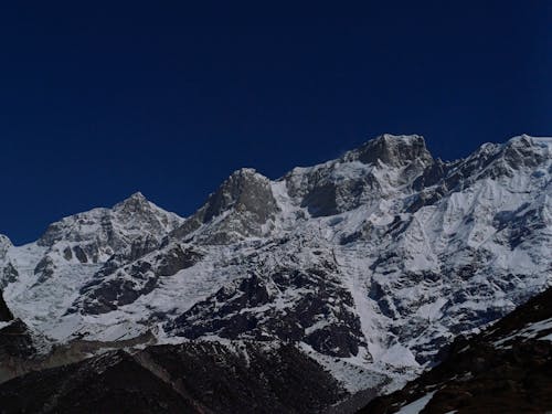 Foto profissional grátis de alta altitude, cadeia de montanhas, céu azul