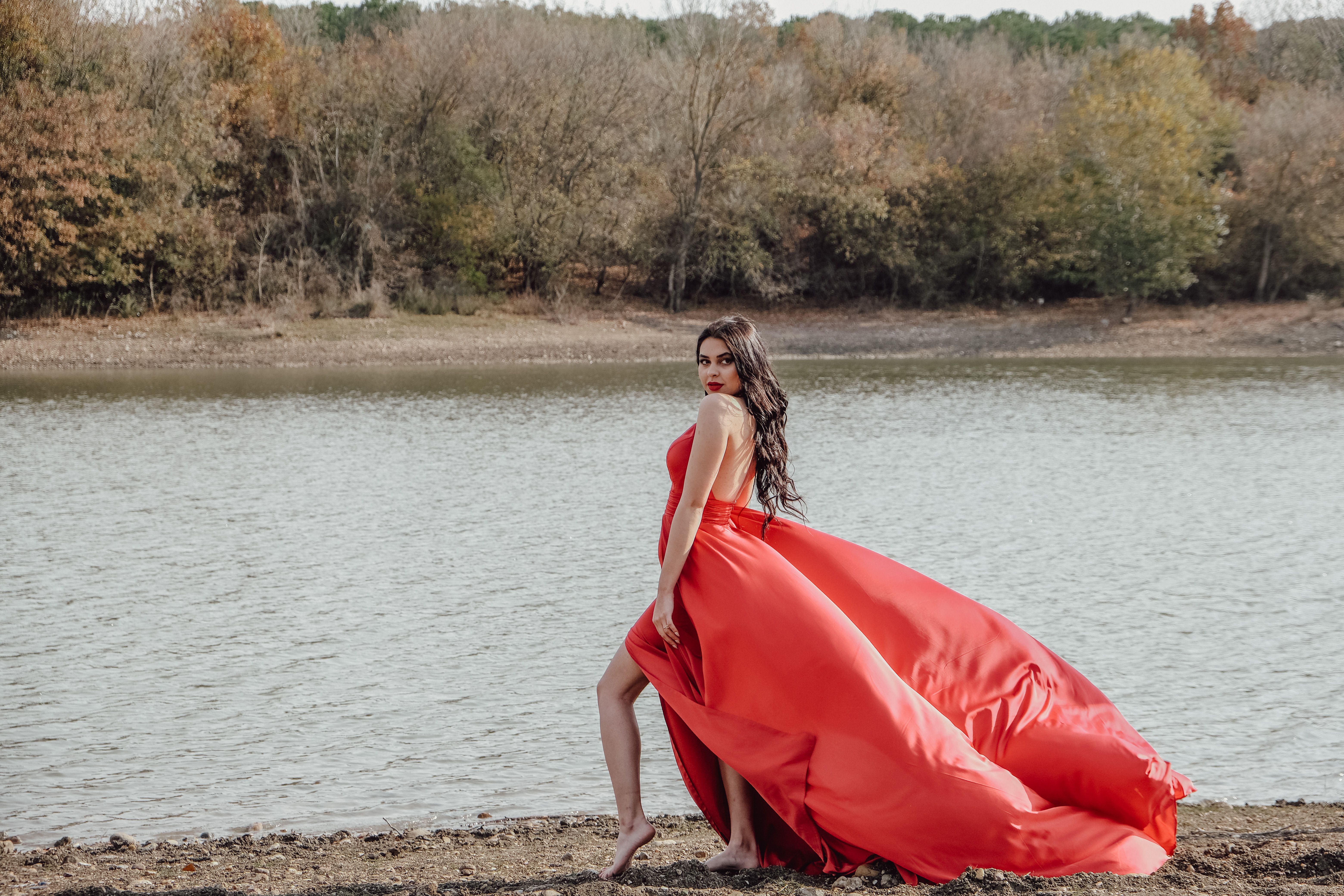 A Woman Wearing Red Dress on the Beach · Free Stock Photo