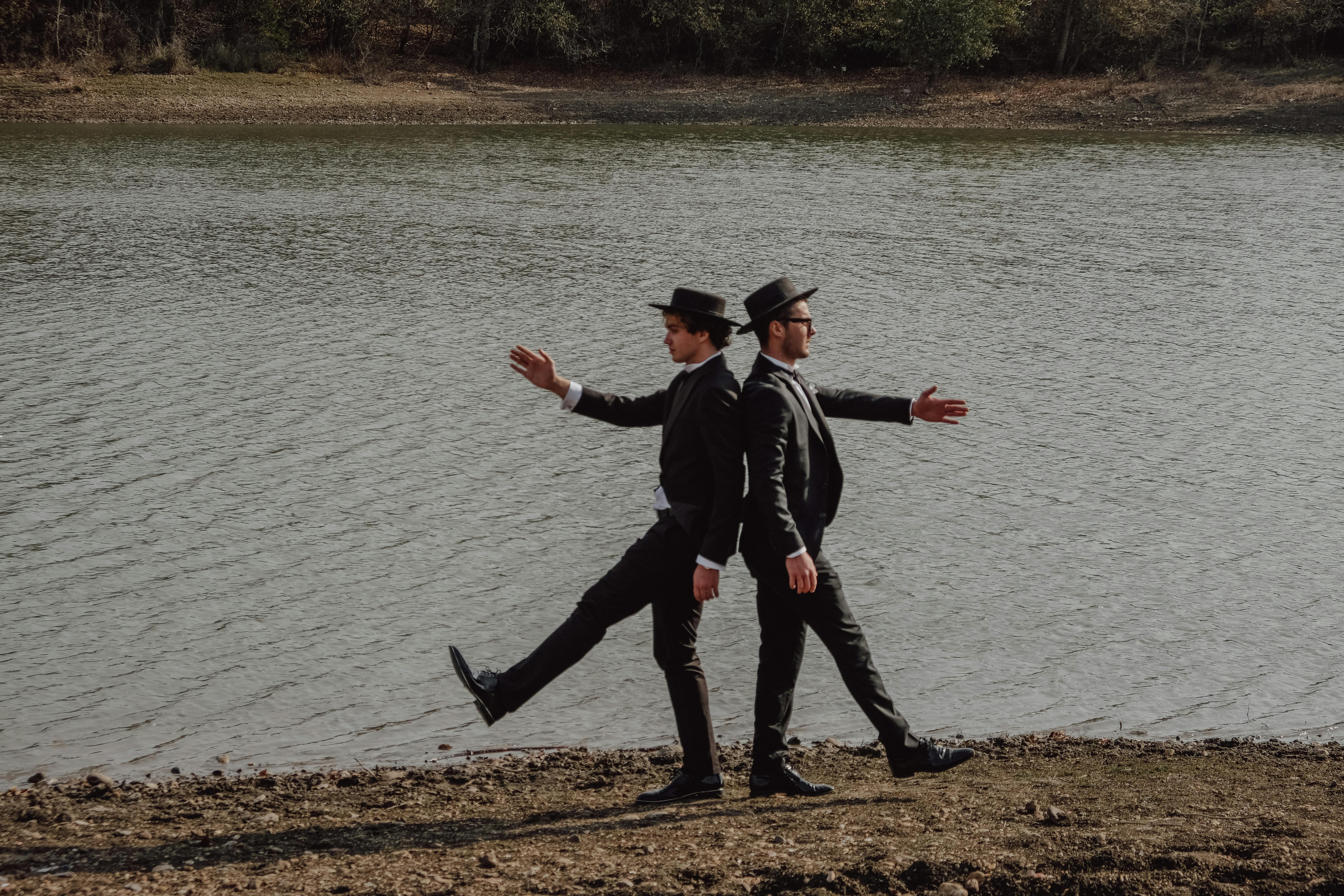 elegant men on the beach